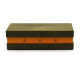 a brown box with a orange stripe on it