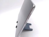 a close up picture of a tablet computer on a stand
