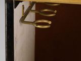 a door with a hook on it and a door handle on the door