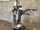 an image of a machine that is sitting in a garage