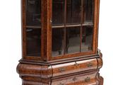 an image of a wooden display cabinet with glass doors