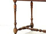 an image of a small table with a drawer on it