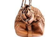 leather handbag on a white background with a white background