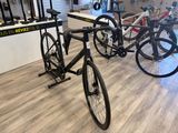 many bikes that are parked in the store