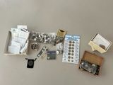 a box of coins and other items that are on the table