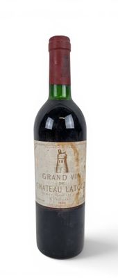 a bottle of wine that is sitting on a table