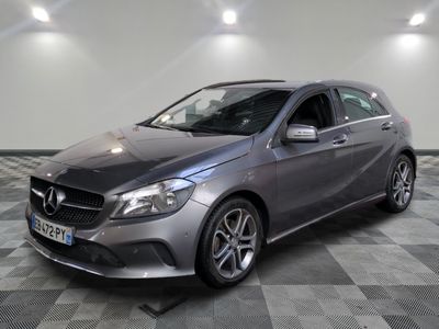 the mercedes b - class is parked on a checkered floor