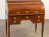an old wooden desk with two drawers and brass pulls