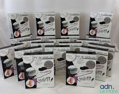 several boxes of different types of baking utensils on a white surface