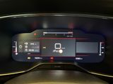 the dashboard of a car with a digital display on it