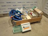 a box of electrical equipment on the floor next to a box of electrical equipment
