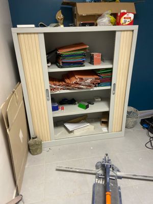 an image of a cluttered room with clutter and tools