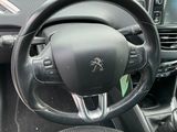 a steering wheel and dashboard of a small car