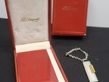 an image of a red box with a silver chain and a red box with a silver chain and a red box with a silver chain and a red box with a