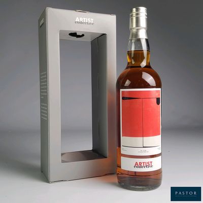 an image of a bottle of whisky sitting next to a box