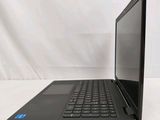 a black laptop with a black keyboard on a white surface