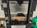 an image of a machine that is in a garage