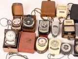 many different types of watches and other items on the table