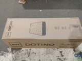 a box that is sitting on the ground with a remote control