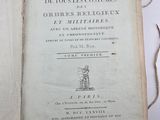 an open book with a drawing of a man on it