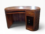 an image of a wooden desk with a drawer underneath it