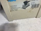 a box with a label on it sitting on the floor