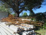 a large tree that is next to a pile of concrete blocks