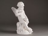statue of an angel with a harp on a gray background