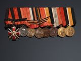 an image of a group of medals and medals on a black background