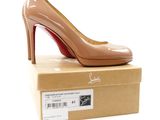 a close up of a box with a pair of shoes on it