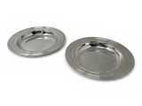 pair of silver plated dishes on a white background