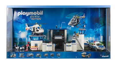 un coffret Playmobil comprenant une voiture de police et un hélicoptère