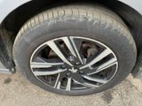 a close up of a tire on the side of a car