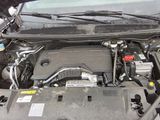 the engine of a car with its hood open and the hood open