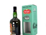 a bottle of rum in front of a box