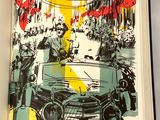 un livre ouvert sur lequel figure le dessin d'un homme dans une voiture