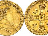 an image of a gold coin with a crown on it