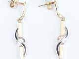 two tone gold and silver earrings with a twist design