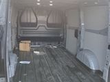 a white van with a flat bed in the back