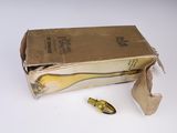 a cardboard box with a bottle of wine inside of it