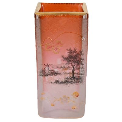 un vase en verre orné d'une image représentant un arbre et un oiseau
