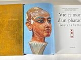a book with a picture of a man ' s face on it