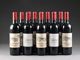 six bottles of red wine are lined up in a row