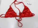 the red bikini top is tied up on a mannequin mannequin mannequin mannequin mannequin mannequin mannequin manne