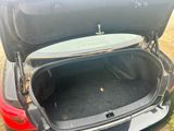 a trunk of a car with the trunk open