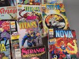 a lot of comic books that are on the table
