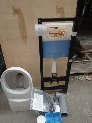 a picture of a toilet in a bathroom being remodeled