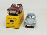two toy cars that are sitting on top of a box