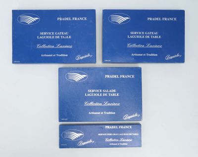 three blue business cards sitting on top of each other on a table