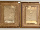 an old picture of two wooden frames with gold paint on them